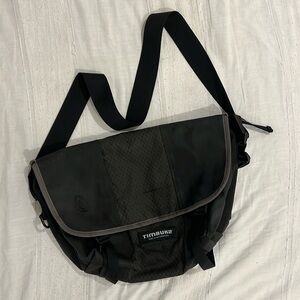 Timbuk2 messenger bag in black with gray accents.